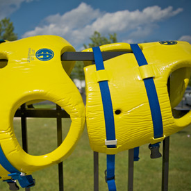 Lifejackets near pool for pool compliance